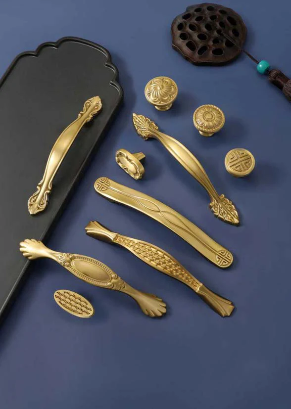 Catalogue selection of decorative handles and knobs with different profiles and finishes