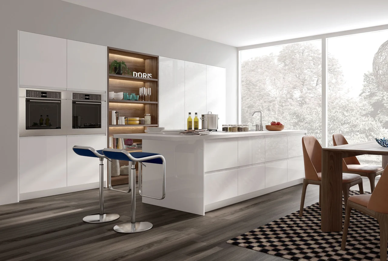 White island kitchen with tall appliance cabinets and a large window