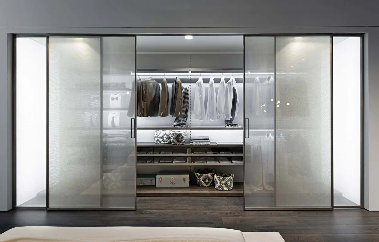 Glass sliding wardrobe doors with a light metal frame