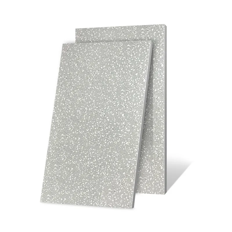 Two grey terrazzo-look tile samples on a white background
