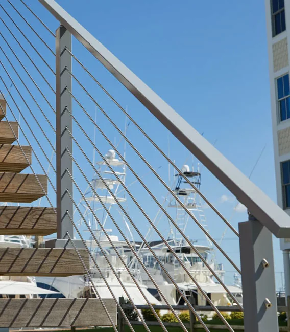 Exterior stair and landing with horizontal stainless-steel railing