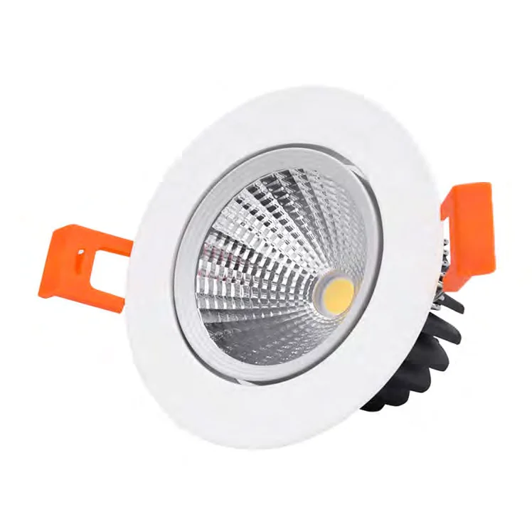 Recessed round spotlight with spring clips and a finned housing