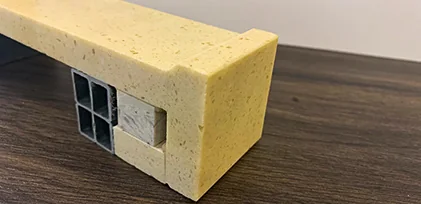 Stone corner sample showing a joined deep edge and exposed backing