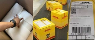 Foam-wrapped contents in a cardboard box beside yellow DHL parcels and a shipping label