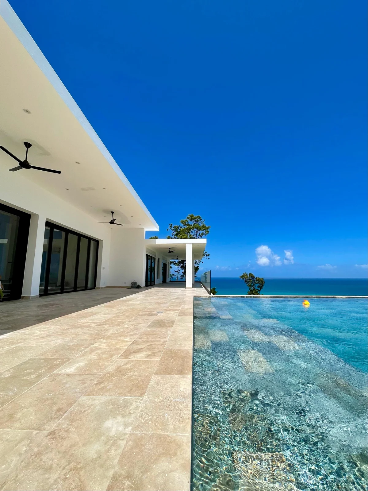 Paved terrace beside a pool at a Dominican Republic villa